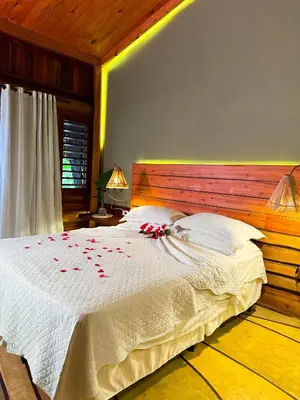 Uma cama ou camas num quarto em Canoé Brasil