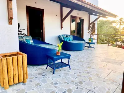 Uma área de estar em Hotel e Pousada Cumbuco Guesthouse