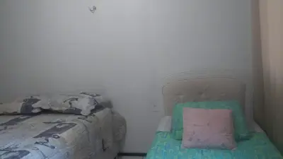 Uma cama ou camas num quarto em Residencial Porto de Iracema