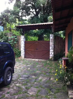 Um jardim no exterior de Sitio Alto da Montanha - você em paz com a natureza