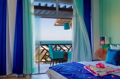 Uma cama ou camas num quarto em Bruno Marambaia Charme Hotel