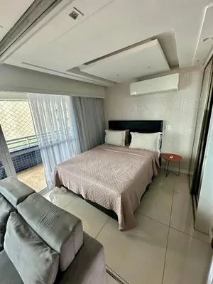 Uma cama ou camas num quarto em Apartamento Vista Mar