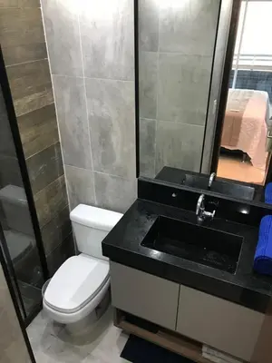 Uma casa de banho em Apartamento Vista Mar