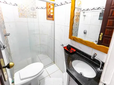 Uma casa de banho em Vila Coqueiros Boutique Hotel