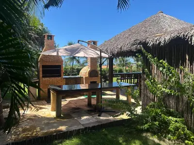 Um jardim no exterior de A Villa 8 suites 30 pessoas