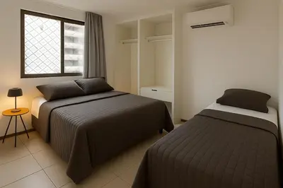 Uma cama ou camas num quarto em Atlantic Ocean Residence