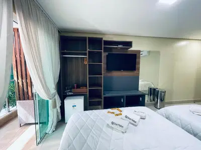 Uma cama ou camas num quarto em Star Hotel