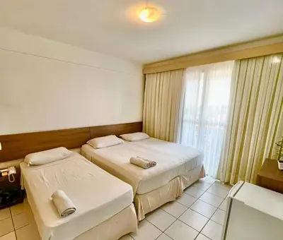 Uma cama ou camas num quarto em Algarve Praia Hotel