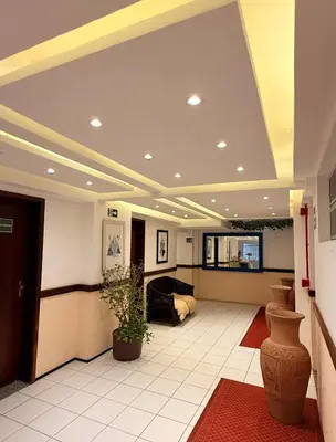 Uma televisão e/ou sistema de entretenimento em Algarve Praia Hotel