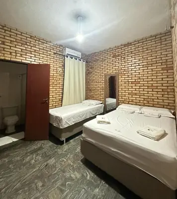 Uma cama ou camas num quarto em Hotel Olho D'água - Baturité