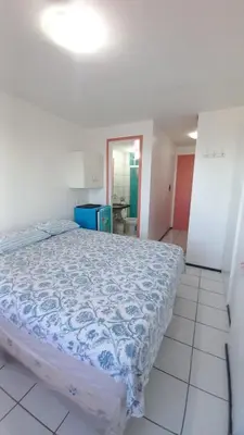 Uma cama ou camas num quarto em STUDIO EM FORTALEZA NO CONDOMINIO VILA DE IRACEMA