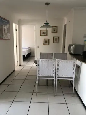 Uma cama ou camas num quarto em Porto de Iracema Residence