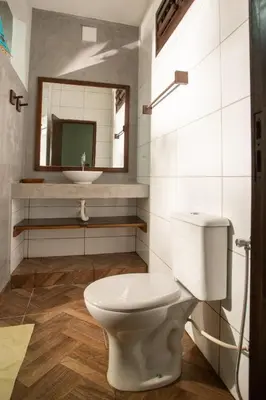 Uma casa de banho em Pousada Por do Sol