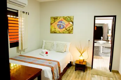 Uma cama ou camas num quarto em Pousada Por do Sol