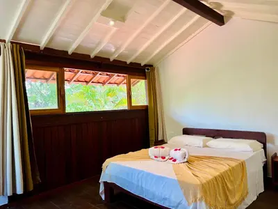 Uma cama ou camas num quarto em Pousada e Restaurante do Paulo