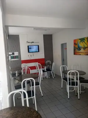Uma televisão e/ou sistema de entretenimento em Pousada Atlantico Centro - Fortaleza
