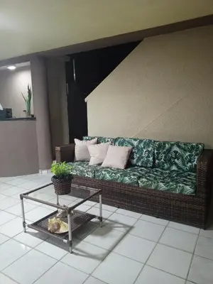 Uma área de estar em Hotel Pousada Cumbuco Gold