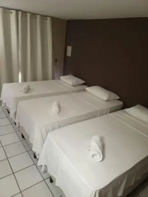 Uma cama ou camas num quarto em Hotel Pousada Cumbuco Gold