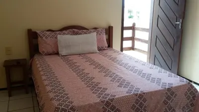 Uma cama ou camas num quarto em Pousada Recanto das Férias