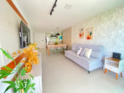 Uma área de estar em Apto. Solárium com vista Piscina Próx. Beach Park