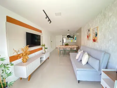 Uma área de estar em Apto. Solárium com vista Piscina Próx. Beach Park