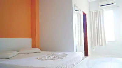 Uma cama ou camas num quarto em Hotel Americas
