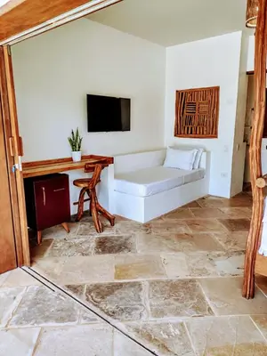 Uma televisão e/ou sistema de entretenimento em Villa Pinolo by Kabana