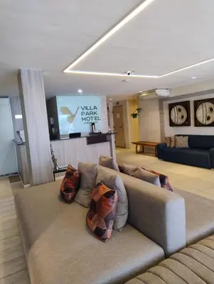 Uma área de estar em Villa Park Hotel Fortaleza