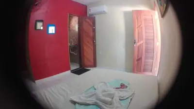 Uma cama ou camas num quarto em Pousada Sena