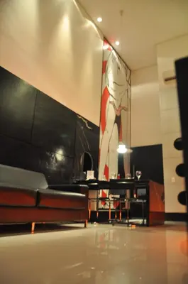 Uma televisão e/ou sistema de entretenimento em Palace Fortaleza Centro de Eventos motel