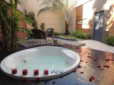 Um jardim no exterior de Palace Fortaleza Centro de Eventos motel