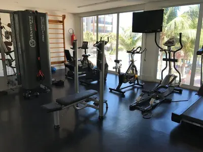 O centro de fitness e/ou as comodidades de fitness de Beach living, Pé na areia, Vizinho ao B Park - Oficial