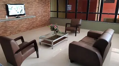 Uma televisão e/ou sistema de entretenimento em Apartamento Porto de Iracema estilo