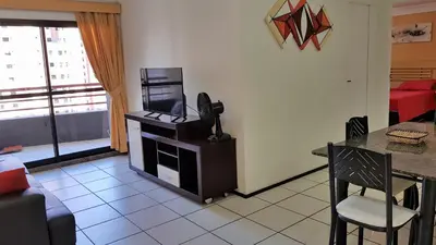 Uma televisão e/ou sistema de entretenimento em Apartamento Porto de Iracema estilo
