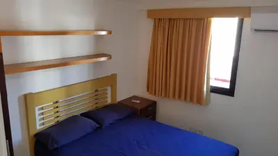 Uma cama ou camas num quarto em Apartamento Porto de Iracema estilo