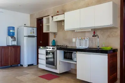 A cozinha ou kitchenette de Apartamento no Taiba Beach Resort