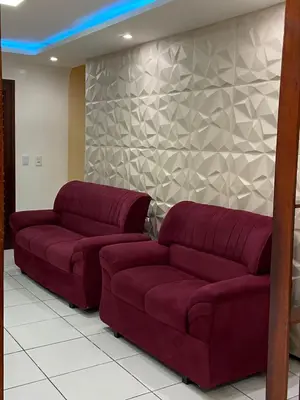 Uma área de estar em Residência Ximenes