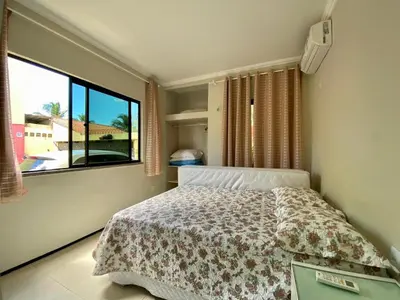 Uma cama ou camas num quarto em Flat Crystal Park Porto das Dunas