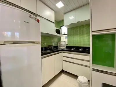 A cozinha ou kitchenette de Flat Crystal Park Porto das Dunas