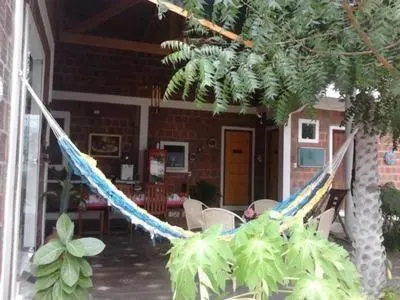 Um jardim no exterior de Brisa da Serra Pousada EM SOBRAL-CE