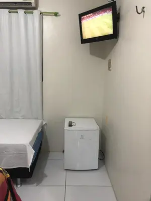 Uma televisão e/ou sistema de entretenimento em Brisa da Serra Pousada EM SOBRAL-CE