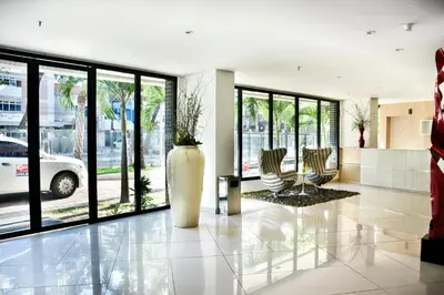 Uma área de estar em Apartamentos Landscape Beira Mar