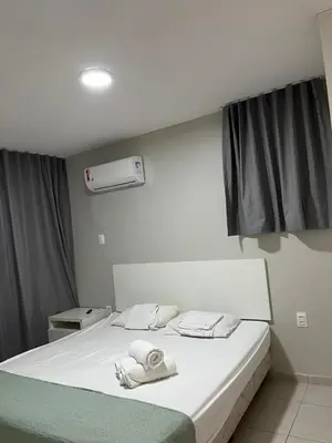 Uma cama ou camas num quarto em Apto Aquaville Resort
