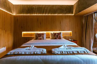 Uma cama ou camas num quarto em Hotel Casa do Mar