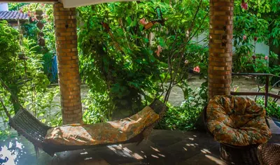 Um jardim no exterior de Pousada Morada do Sol