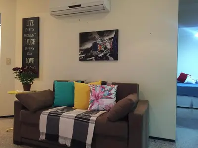 Uma área de estar em Apartamento Frente mar Meireles