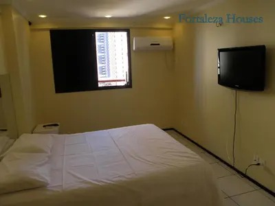 Uma televisão e/ou sistema de entretenimento em Porto de Iracema - Fortaleza houses