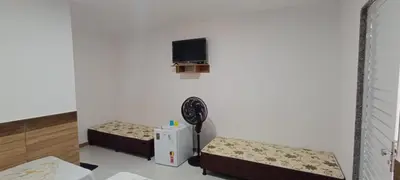 Uma cama ou camas num quarto em Pousada Chalet La Pink