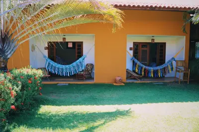 Um jardim no exterior de Pouso do Kite Pousada Flecheiras