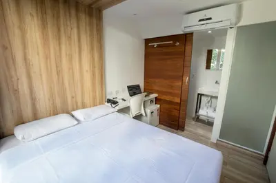 Uma cama ou camas num quarto em Ecco Hotel Fortaleza